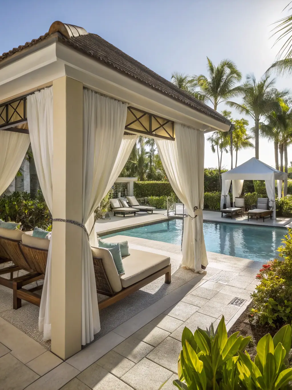 A photograph of a luxurious cabana at the Aura Skypool, complete with comfortable seating, plush towels, and personalized service.